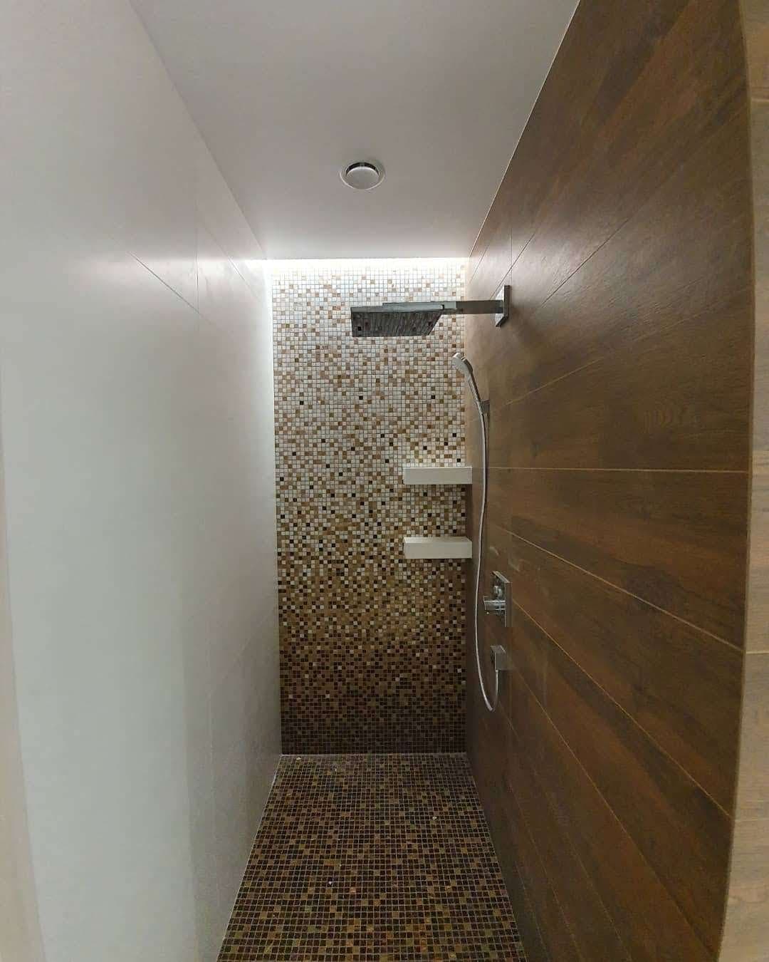 Walk in shower with gradient mosaic tile, earlier work