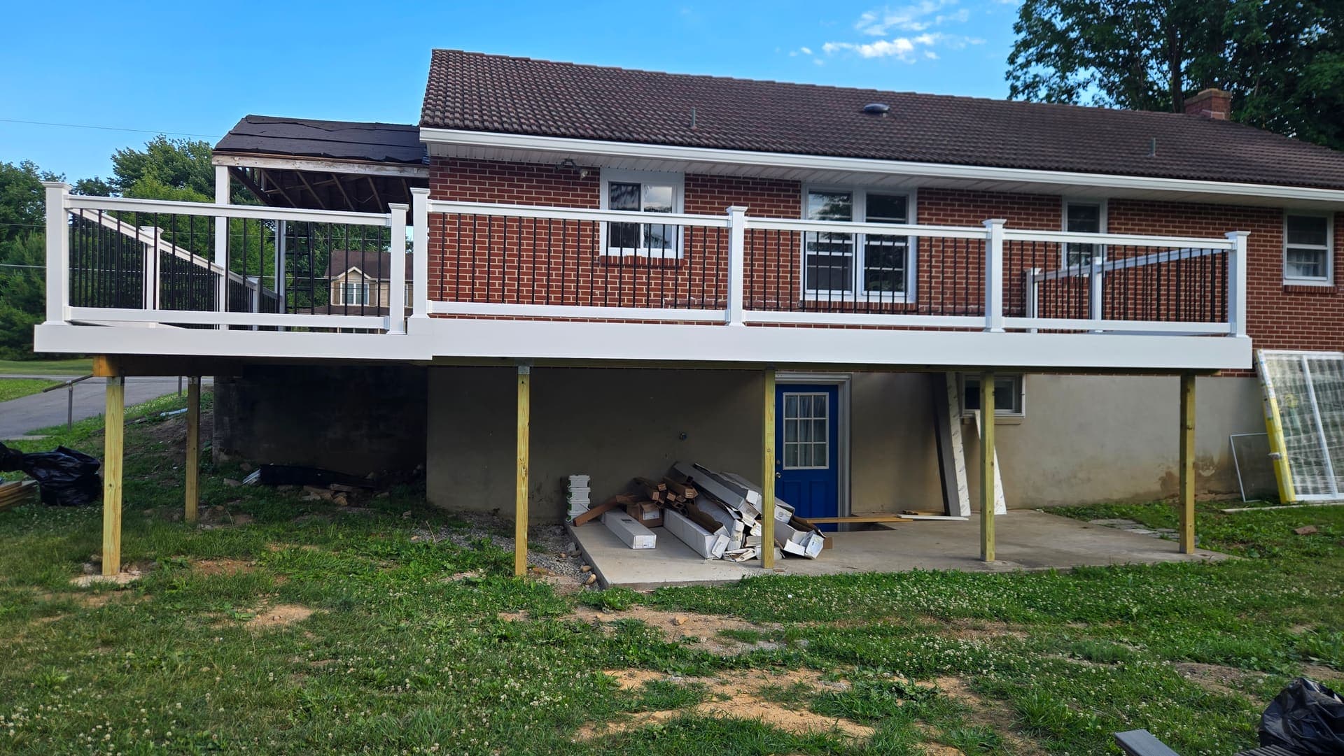 Elevated composite deck built on a brick ranch home